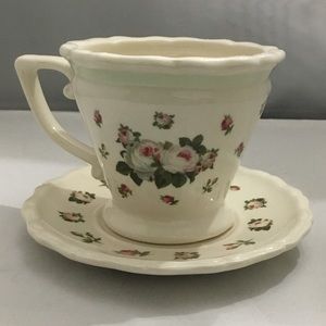 Floral tea cup and saucer by Michel and company